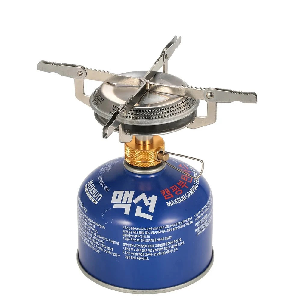 Réchaud à gaz de camping ultraléger Outdoor Perf avec brûleur compact et bouteille de gaz, idéal pour les activités en plein air.