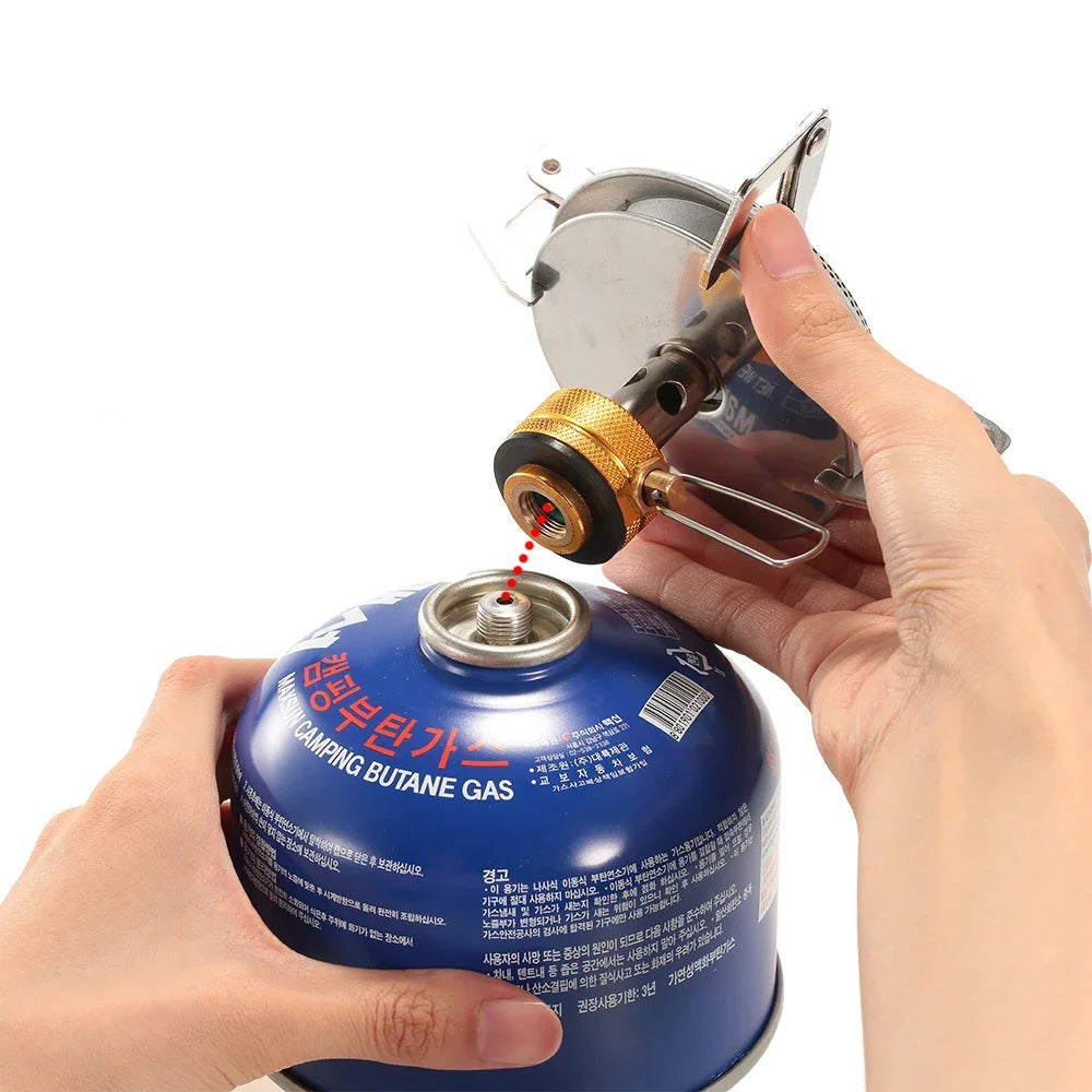 Réchaud à gaz de camping ultraléger Outdoor Perf, compact et léger, prêt à être utilisé pour la cuisine en plein air.